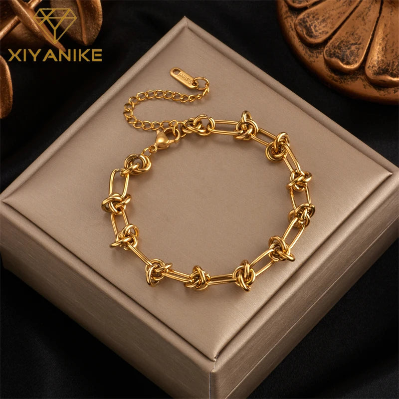 Pulseira entre meio de nó folheado a ouro 18k